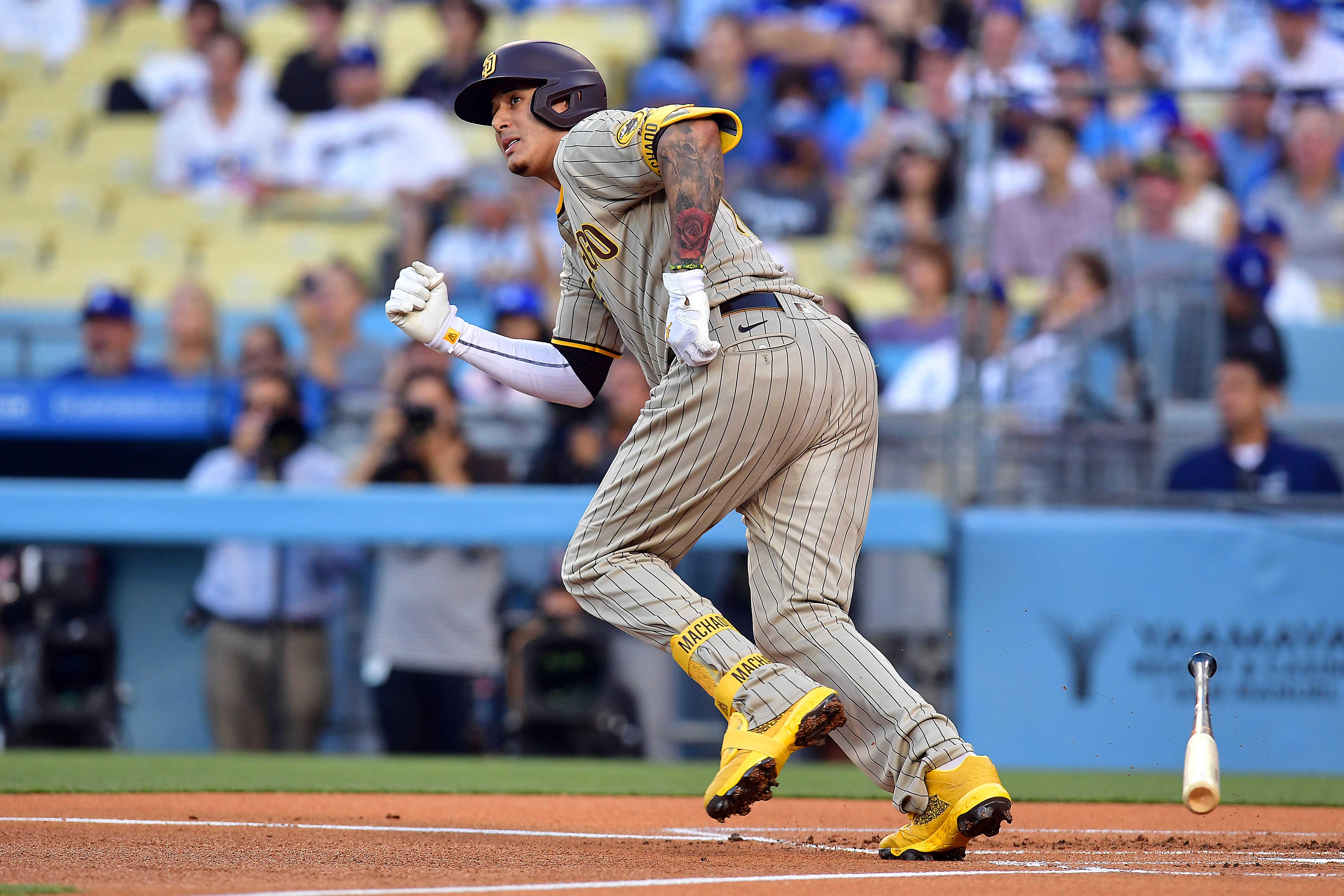 Padres place Machado on IL with hand fracture